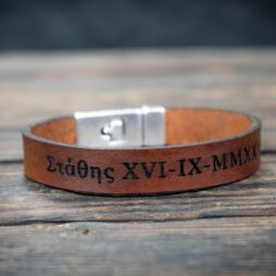 personilised leather bracelet on wooden table