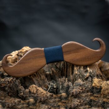 moustache shaped bowtie blue fabric on wood display