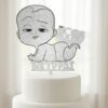 Cake topper με τη φιγούρα του Baby Boss και χαραγμένο το όνομα "Βίκτωρας" από ασημί glitter ξύλο.